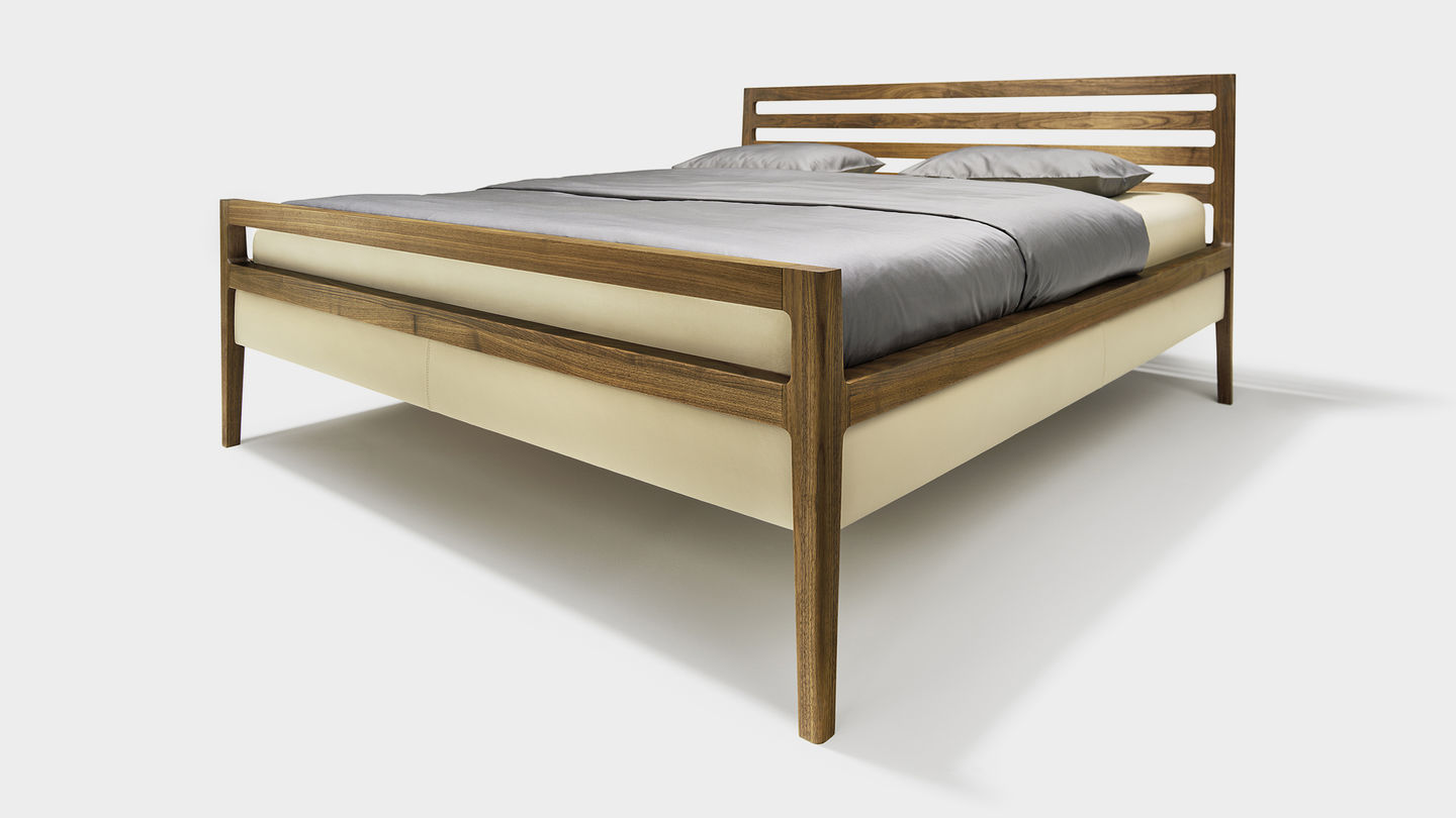 mylon bed in walnut made of solid wood
