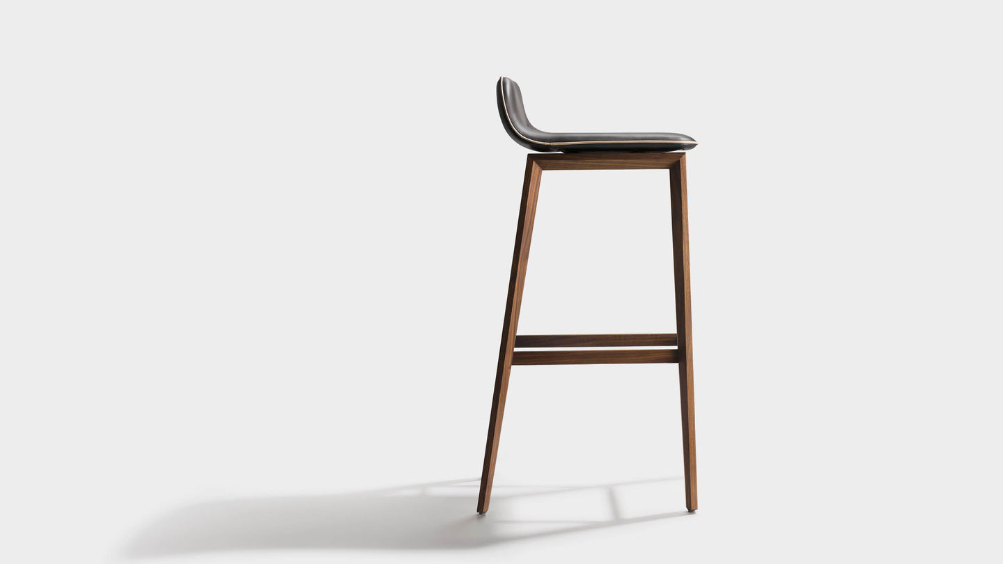 ark bar stool with wooden legs made of solid wood in walnut