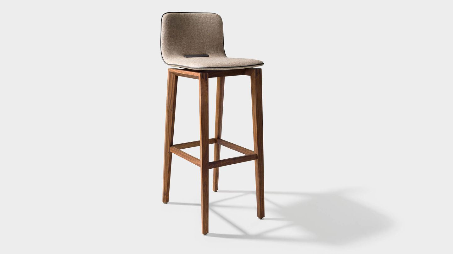 ark bar stool in fabric with wooden legs in walnut