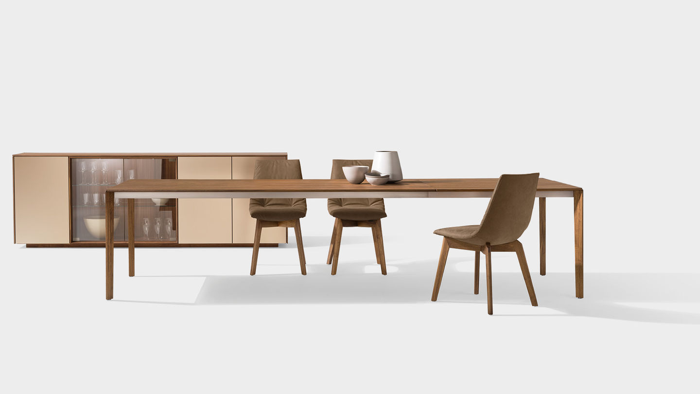 tak extendable dining table with wooden legs in walnut