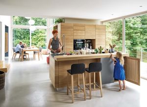 linee solid wood kitchen in oak with ark bar stool