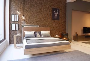 float solid wood bed in oak at TEAM 7 store Munich