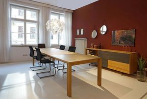 magnum extendable table with cantilever chairs Stricktex at TEAM 7 Munich