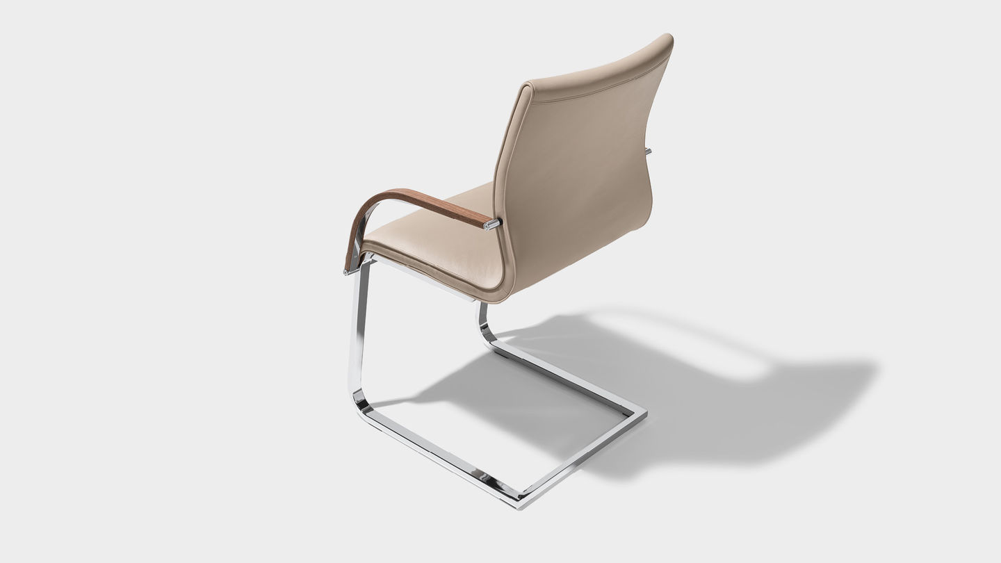 magnum chair leather with armrests by TEAM 7